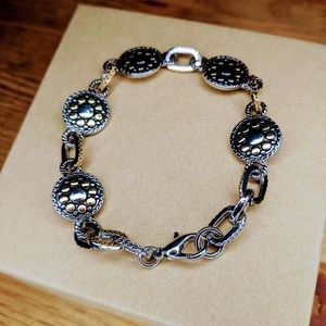 Silver and gold tone bracelet